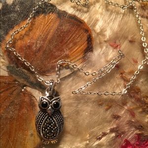 Silver owl necklace with dark stones